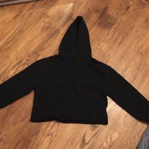 Black cropped hoodie.